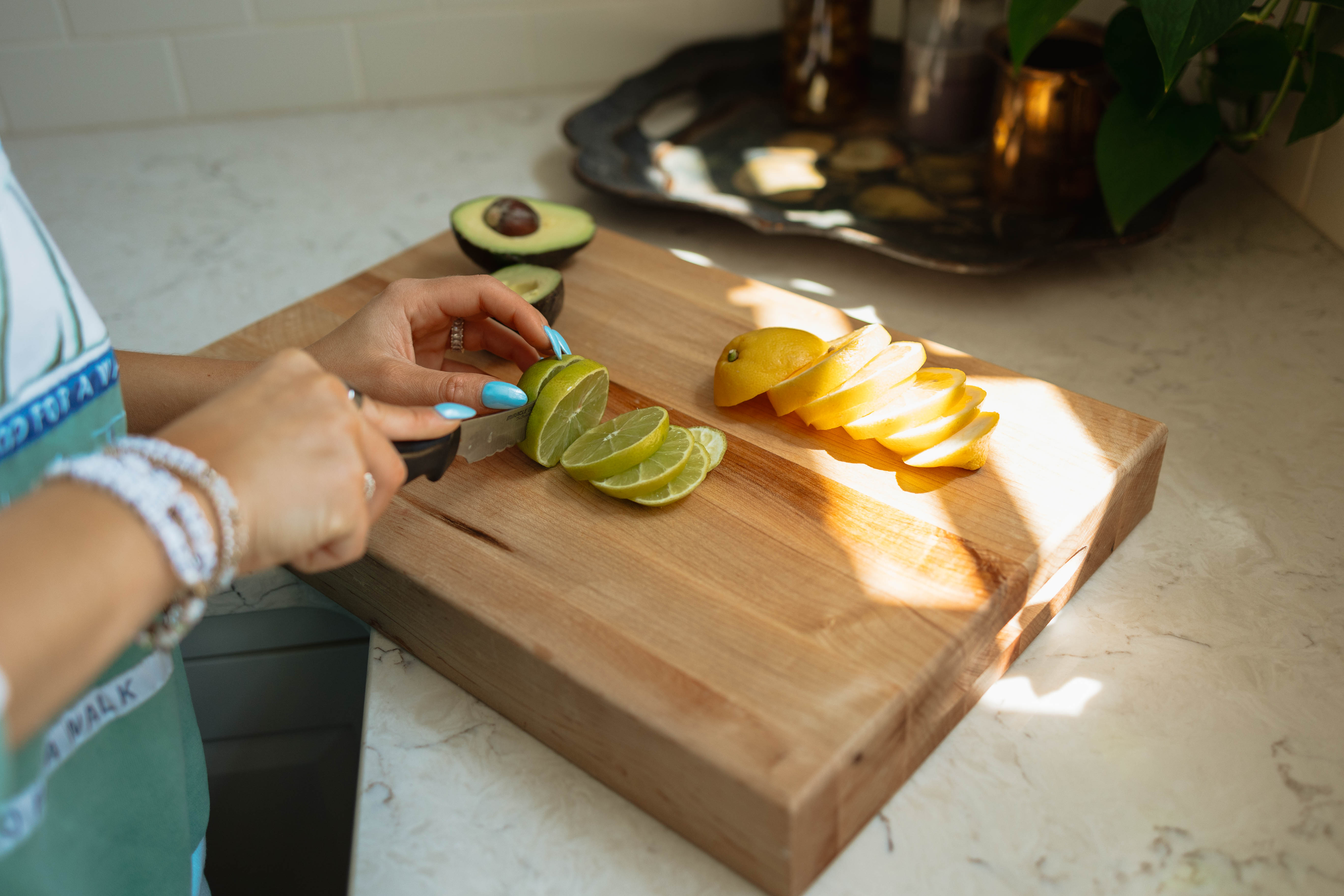Hands preparing fresh citrus